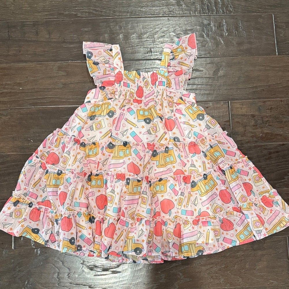Charming Pink Kids Dress with Playful Print